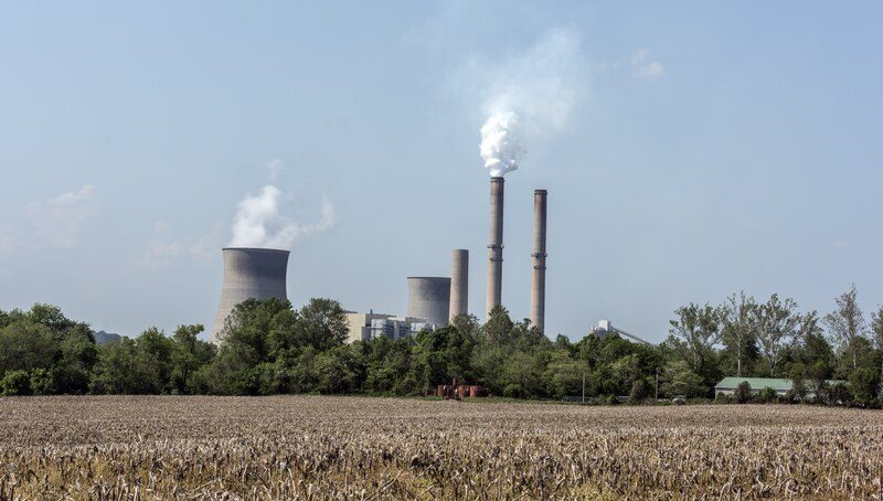 Power plant smokestacks and cooling towers along the Ohio River